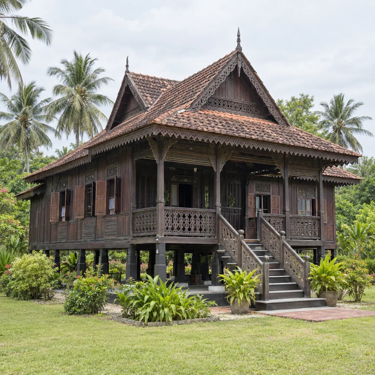 Photo réaliste: Coloriage de la Malaisie : maison en bois sur pilotis